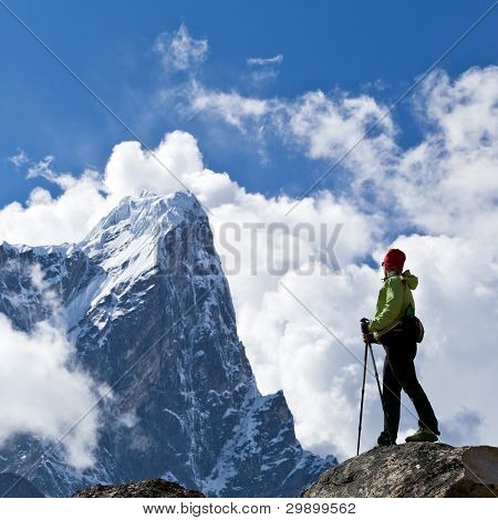 Woman Hiking In Himalaya Mountains