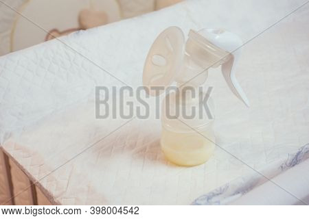 Manual Breast Pump, Mothers Breast Milk Giving Healthy Food For Newborn Baby