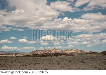 Distant Bentonite Hills In Capitol Reef National Park