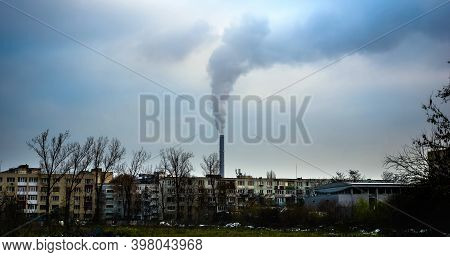 Bucharest, Romania - December 02, 2020: Chimney Of Cet Progresul Power Plant, Pollute With Smoke Fro