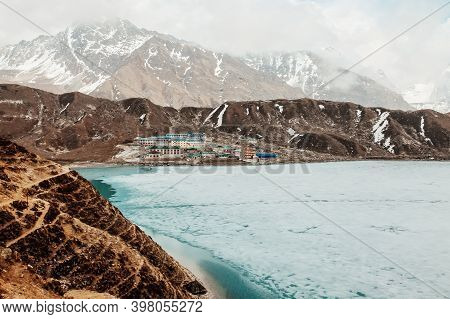 Amazing Blue Gokio Lake Under Ice And Snow, Nepal, Himalayas