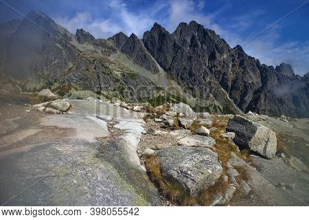 Velka Studena Dolina, High Tatras - Stones By The Tourist Trail With The Background Of Tatra Peaks D