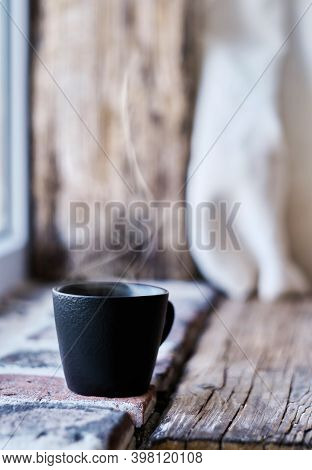 Steaming Cup With Ristretto Coffee On Brick And Wooden Vintage Background. Close-up, Selective Focus