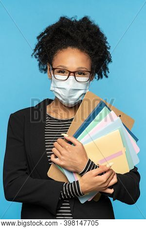 Teacher Or Student In Blazer, Wear Glasses And Face Mask, Holding Notebooks, Documents And Folder, L