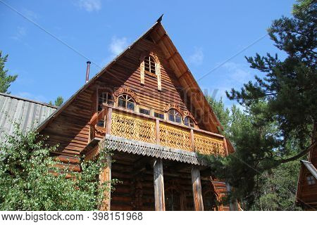 An Old Russian Wooden House Of Round Logs, Called Terem