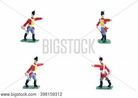 4 In 1 Photo Of Handmade Tin Soldiers With Sword On The White Background