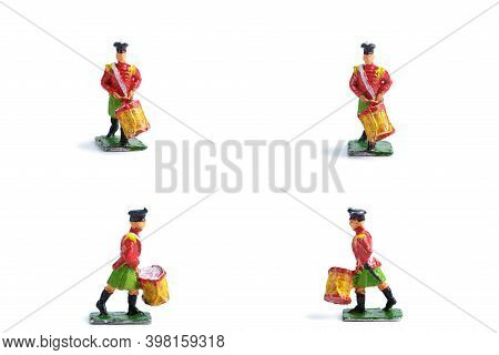 4 In 1 Image Of Handmade Tin Soldiers With Drum On The White Background
