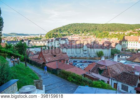 Sighisoara, Romania - August, 2019: Panoramic View Of Beautiful Colorful Houses In Sighisoara, Roman