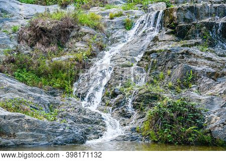 Flowing Water Of Mae Pool (or Mae Phun) Waterfalls In Laplae District Is One Of The Famous Tourist A