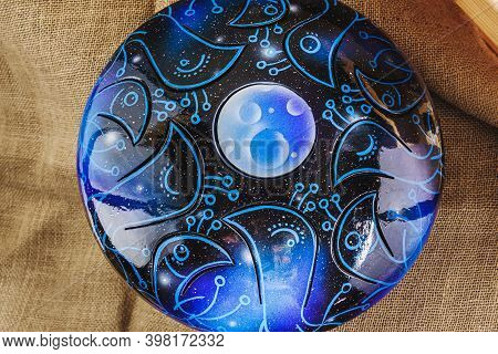 Colors Steel Tongue Drum, Vadjraghanta, Tank Drum Close-up Modern Musical Instrument