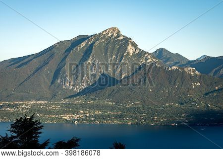 Aerial View Of The Lake Garda And Italian Alps With The Peak Of Monte Pizzocolo And Monte Castello D