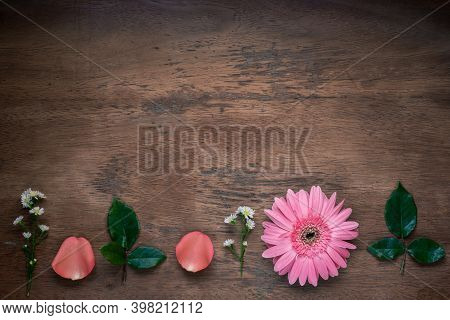 Pink Gerbera Flower Decoration On Rustic Wooden Table, Copy Space