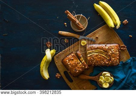 Freshly Baked Banana Bread, Sliced On A Cutting Board, With Banana, Cinnamon And Nuts. Bake Shop, Ho