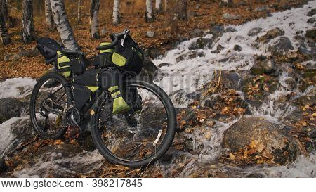 The Mixed Terrain Cycle Touring Bike With Bikepacking.the Trip On Bike, Outdoor In Magical Autumn Fo