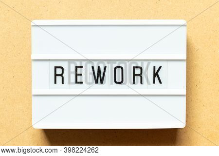 Lightbox With Word Rework On Wood Background