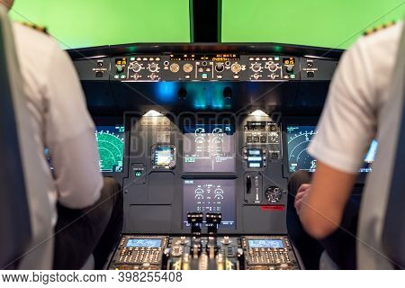 Gdansk, Poland - December 06, 2020: Illuminated Cockpit Of Flight Simulator For The Training Of The