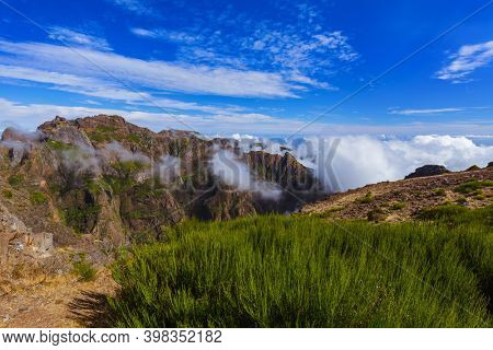 Hiking Pico do Arierio and Pico Ruivo - Madeira Portugal - travel background