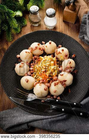 Meat Stuffed Potato Dumplings With Fried Onion And Greaves.