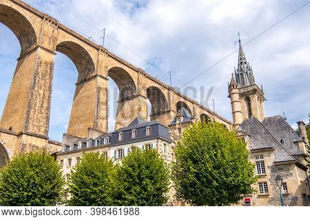 Morlaix, France - August 28, 2019: Eglise Saint-melaine Or Church Of Saint-melaine Near The Viaduct 