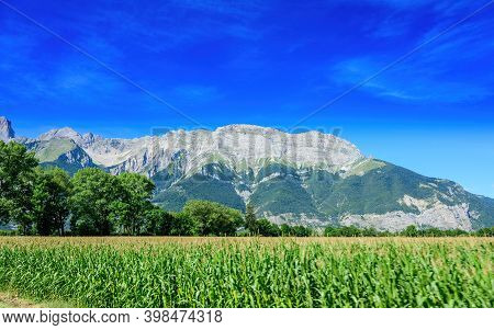 Panoramic View On Breche De Faraut Mountain Range In French Prealps In Summer