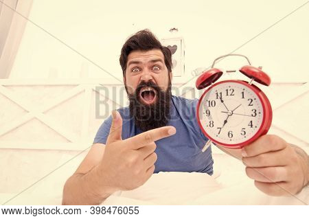 What Time Is It. Stressed Man Alarm Clock. Sleepy Man Holding Alarm Clock In Bed. Bearded Man With A