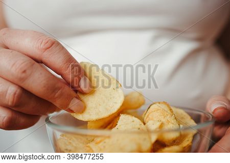 Compulsive Overeating, Mindless Snacking, Junk Food, Unhealthy Meals. Woman Eating Chips From Bowl, 