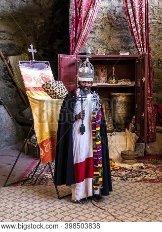 Lalibela, Ethiopia - Feb 14, 2020: Ethiopian Priest At The Famous Monastery Neakuto Leab Near Lalibe