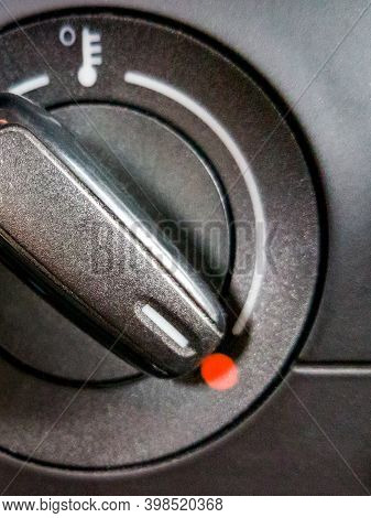 Fragment Of Car Temperature Controller In Red Area Set At High Values. Icon Of Temperature,