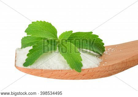 Stevia With White Sugar On A Wooden Spoon