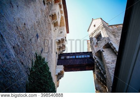 Gothic Imposing Historic Castle Pernstejn At Sunny Summer Day, Stronghold On Rock Above Village Of N