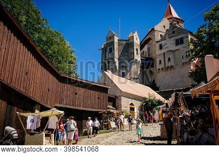Gothic Imposing Historic Castle Pernstejn At Sunny Summer Day, Stronghold On Rock Above Village Of N