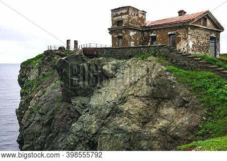 Huge Rocks On The Ocean, Sea Summer Landscape, Old Stone Building On A High Cliff, Gamova Lighthouse