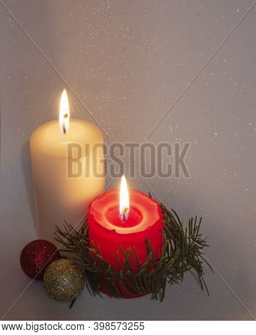 Congratulations On The Holiday. Postcard With Candles And A Rose On A Pink And White Background