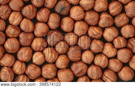 Hazelnuts Heap As A Background. Top View. Flat Lay. Hazel Nuts Pattern