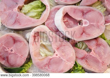 Mackerel Fish Steaks Close Up. Fresh Raw Fish Slices On Counter At Supermarket.
