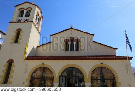 Greek Orthodox Church With Byzantine And Greek Flags In Kos, Greece