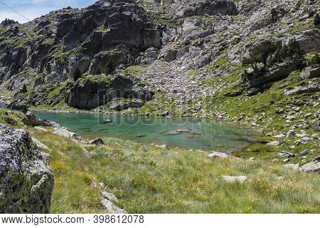 Munyidera Lake At Summer, Aigües Tortes And Estany Of Sant Maurici National Park, Lleida, Catalonia,