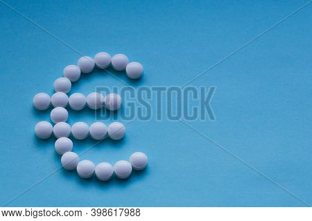 Expensive Drugs Concept, Pills And Money Isolated On Light Background.