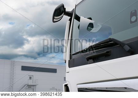 Truck Parked Close Up. Trucks And Semi-trailers Are Parked In A Service Station. Logistics And Trans