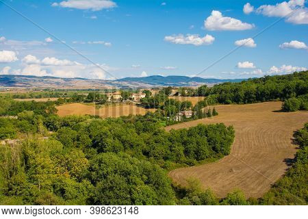 Bagno,Vignoni, Italy - September 3rd 2020. The late summer landscape around Bagno Vignoni in in Val d\'Orcia, Siena Province, Tuscany, Italy