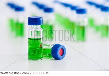 Hplc Vials With Green Sample Of Plant Extracts. Developing Of Drugs Based On Natural Products. Bioch