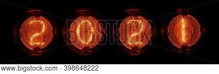 Nixie Light Bulbs, Tubes With Digits 2021. Vintage Style Christmas Photo On A Dark Background.