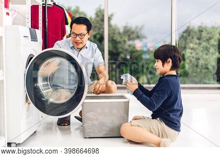 Family Asian Father And Kid Little Boy Son Having Fun Doing Household Chores Doing Laundry Dirty Clo