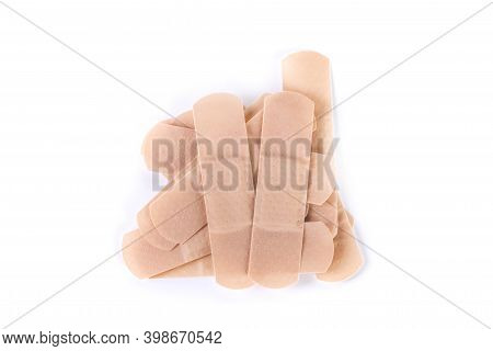 Pile Of Flesh Colored Bandage Strips Top Down View