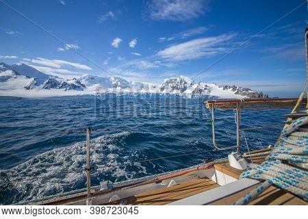 Part Of Yacht With Icebergs Landscape In Antarctica. Extreme Travelling, Sailing.