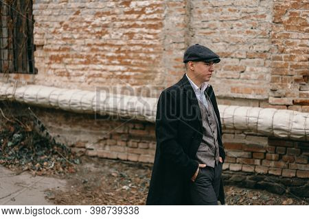 Portrait Of A Man In Retro Style. Peaky Blinders. Vintage.