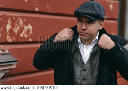Portrait Of A Man In Retro Style. Peaky Blinders. Vintage.