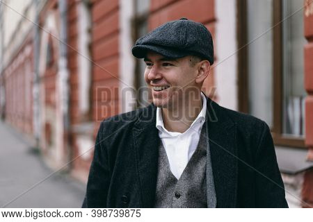 Portrait Of A Man In Retro Style. Peaky Blinders. Vintage.