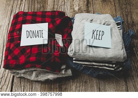 Stack Of Old Clothes To Discard (declutter) Or Keep. Recycle Clothes, Eco Cotton.
