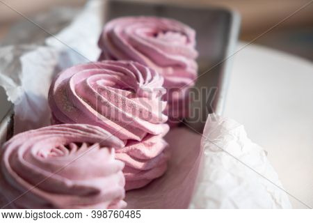 Pink Strawberry Homemade Zephyr Or Marshmallow In A Rectangular Oleum Plate. Side View, Close-up, Se
